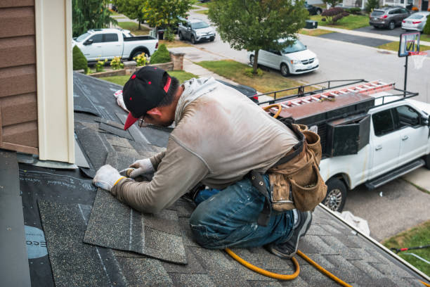 Professional Roofing technician working in Suffern, NY
